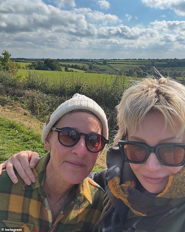 Ellen DeGeneres and Portia de Rossi pose for a photo in The Cotswolds – which they now call home