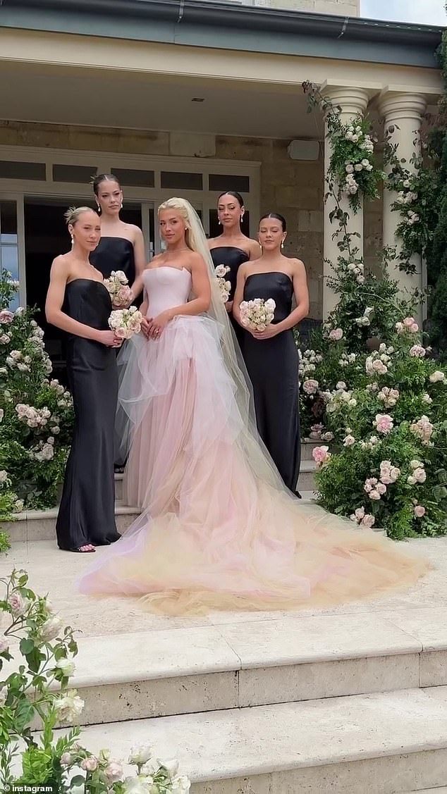 Tammy Hembrow's older sister Emilee has been spotted wearing the $520 bridesmaid dress she wore to the fitness influencer's wedding just 10 days after the ceremony