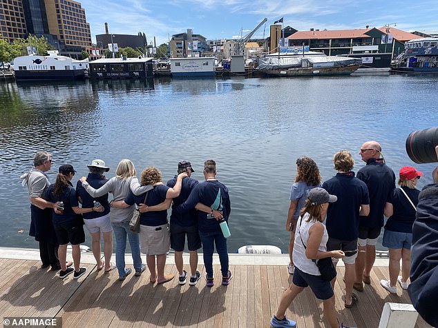 Police will investigate the deaths of the two sailors, which took place off the NSW south coast, and prepare a report for the coroner that could trigger an inquest (people gather at Constitution Dock in Hobart to see Mr Smith and Mr Quaden commemorate)