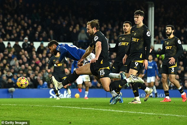 Craig Dawson (centre) scored two own goals as Everton beat Wolves 4-0 on Wednesday