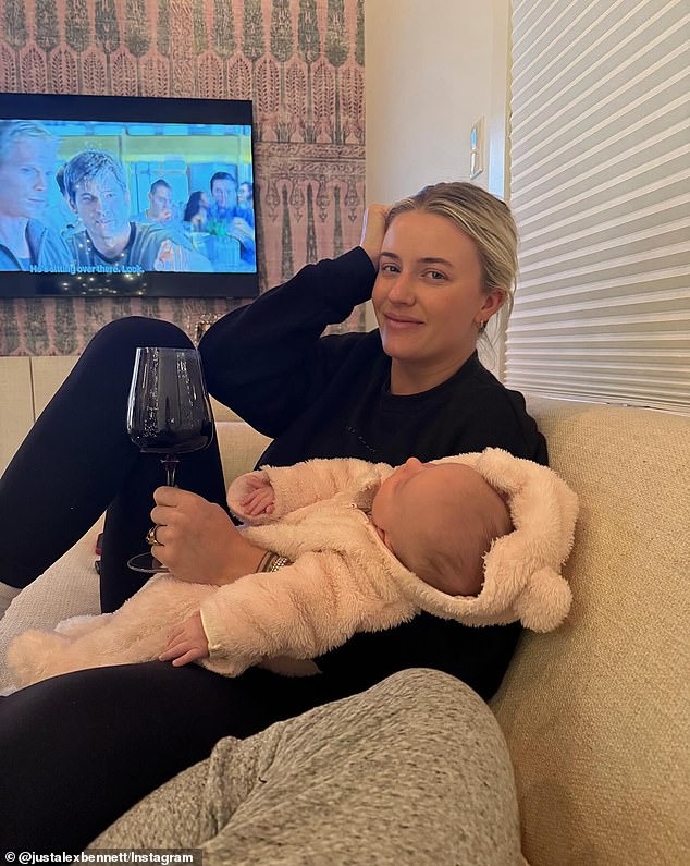 Momfluencer Alex Hodges has been criticized for the 'irresponsible' way she held her baby in a photo she posted to Instagram