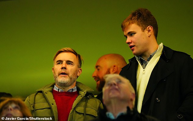 Gary Barlow, 53, was overshadowed by lookalike son Daniel, 24, as they watched Chelsea FC play Brentford from the stands at Stamford Bridge on Sunday