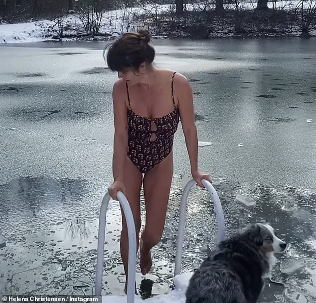 Helena Christensen showed off her incredible figure as she took a quick dip in a frozen pond on Sunday