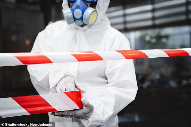 Officers in hazmat suits arrested Emmanuel Steven Lidden for importing and possessing nuclear material without authorization (stock photo)