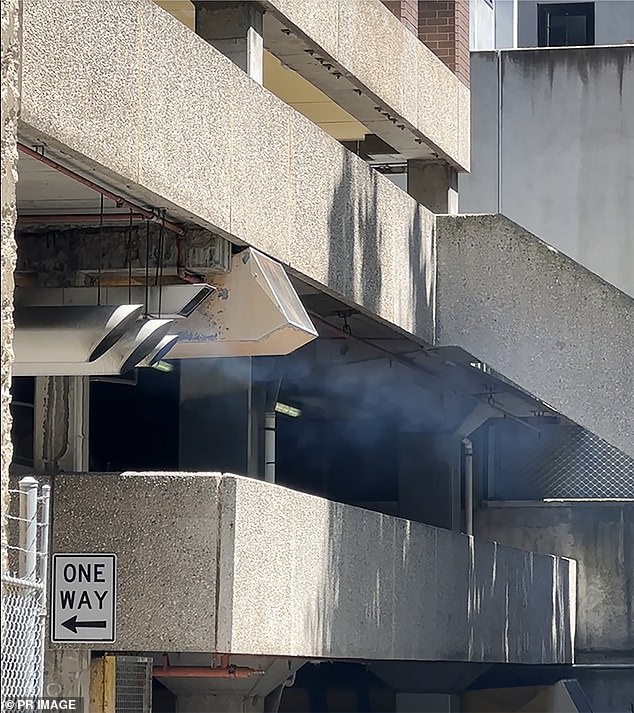 A supplied undated image, obtained on Friday, December 6, 2024, shows smoke fumes pouring from TasTAFE Campbell Street Campus in Hobart, Tasmania