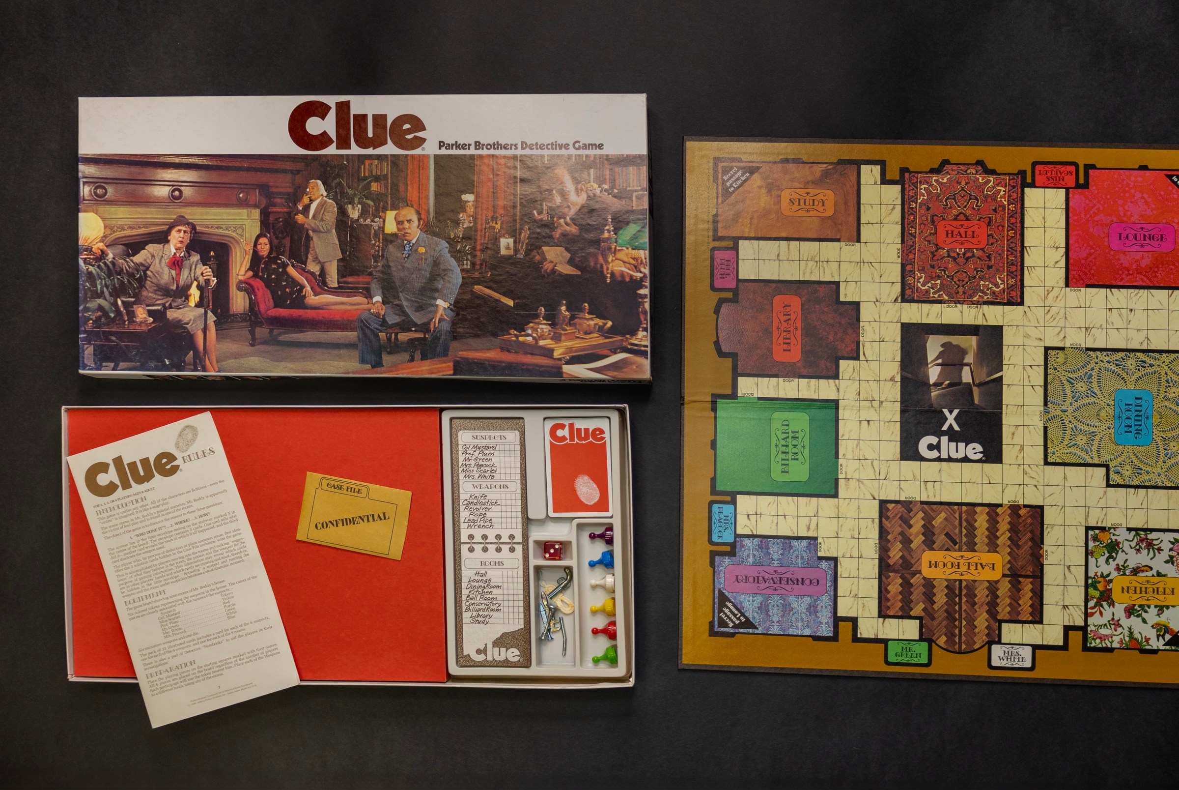 The 1972 edition of Clue, including the board, box and accessories.