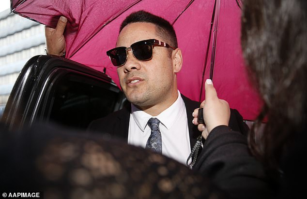 Jarryd Hayne is photographed outside a Newcastle court as he was sentenced on May 6, 2021 - the day one of his supporters spat at the woman who accused him of rape