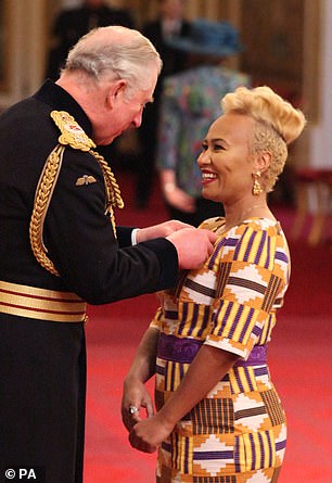 Kind words: Emeli receives her MBE from the then Prince Charles in 2018 for services to music