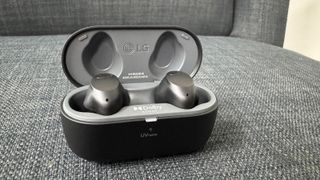 LG ToneFree T90S earbuds in their case