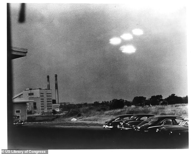 Above, U.S. Coast Guard photographer Shell Alpert took this photo through a window screen on July 16, 1952 - reportedly capturing four unidentified flying objects in a 'V' formation over the Salem Massachusetts Air Station - in the early days of the 'UFOs and The Mystery of nuclear weapons