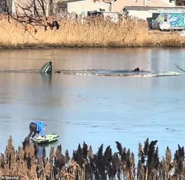 Masotto is seen carefully making his way across the frozen creek in search of the icy man