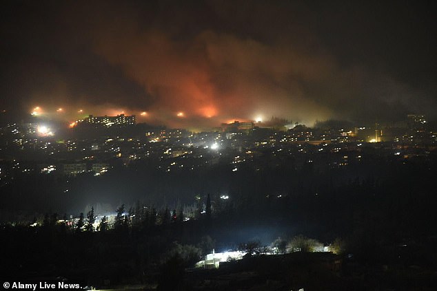 Israel's Foreign Minister said Israeli warplanes hit suspected chemical weapons facilities in Syria. Pictured is smoke rising after airstrikes in Damascus