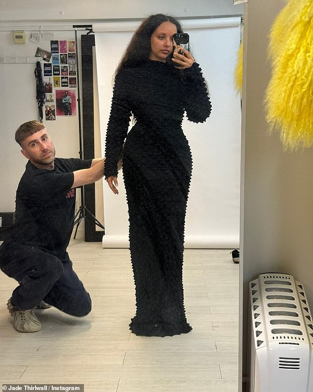 Jade showed off her hourglass figure in a floor-length dress complete with sleeves and ruffles in the latest photo of herself she shared