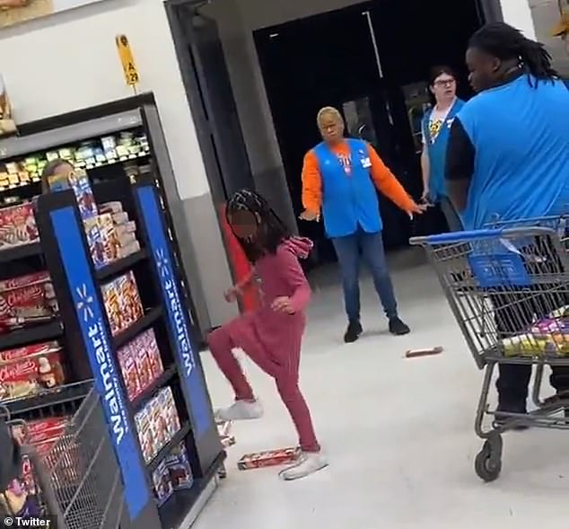 The excited little girl was filmed stomping on the groceries she threw on the floor