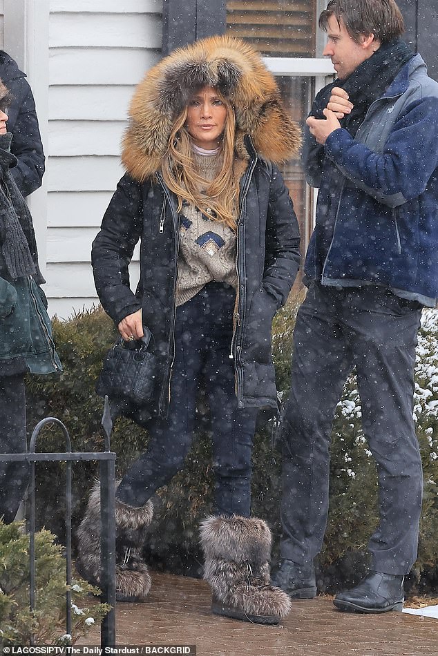 The 55-year-old singer dressed up in layers as she enjoyed a white Christmas and a delicious meal at the White House Tavern restaurant in the celebrity hotspot Colorado