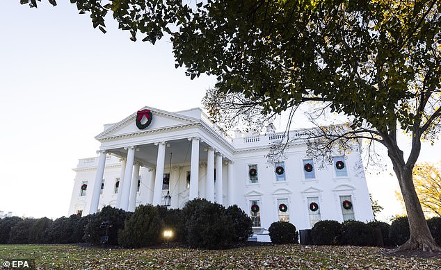 As every year, the exterior of the White House was decorated with more than a dozen wreaths with red bows in each front window, as well as the top of the north overhang of the lawn.