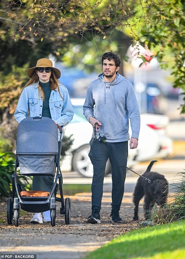 The Jumanji star and her husband Nick Kocher, 38, enjoyed a sunny day walk, with the actress pushing a gray stroller, after welcoming their first child together