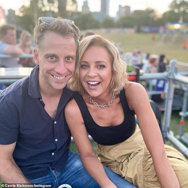 Kate Ritchie, 46, was spotted getting close to Hit Network radio host Carrie Bickmore's, 43, (right) ex-husband Chris Walker (left) during the ABC Upfronts on Nov. 21