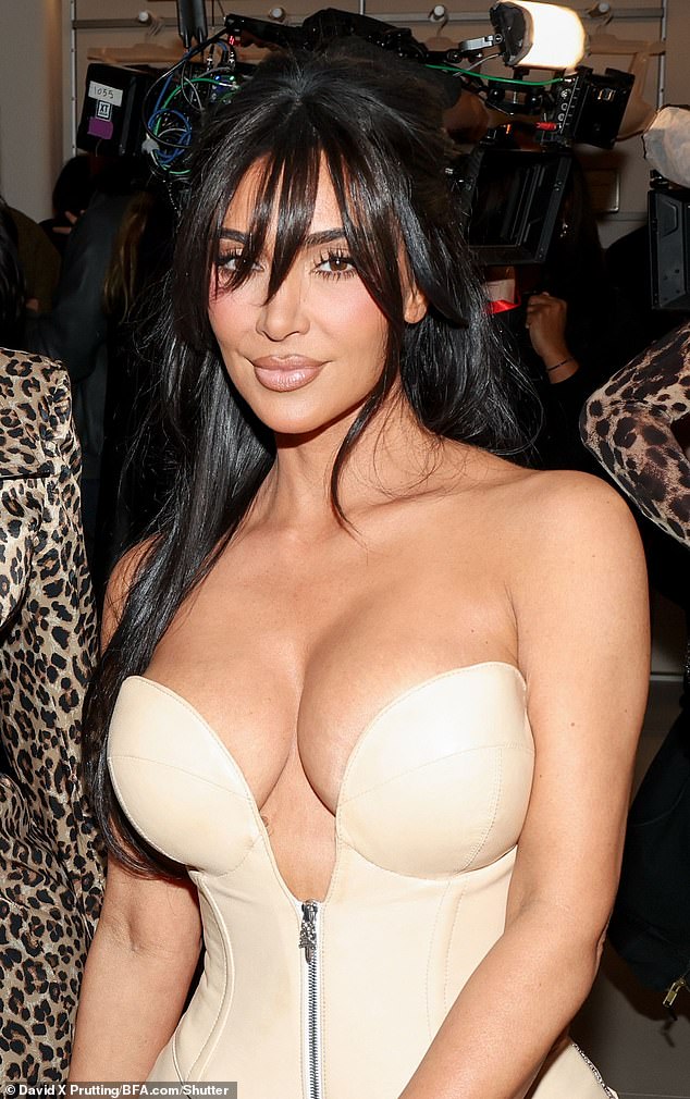 Kim Kardashian's face looked very different Thursday at the grand opening of her flagship Skims store in New York City. And fans think they know why