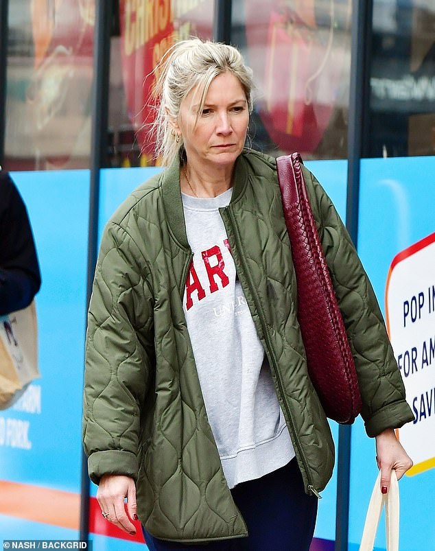 Lisa Faulkner cut a dejected figure on Monday as she stepped out in North London amid her husband John Torode's apparent feud with Gregg Wallace