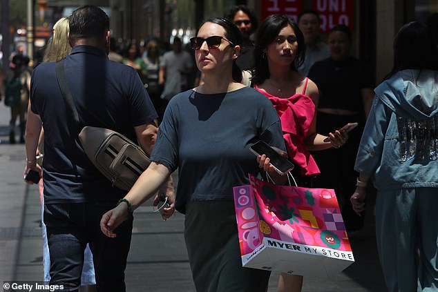 Australian home borrowers were dealt a major blow just before Christmas, with the Reserve Bank denying them a rate cut (pictured is a Sydney customer)