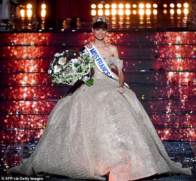 Miss France 2024, Miss Nord-Pas-de-Calais Eve Gilles, is seen on stage after winning the title