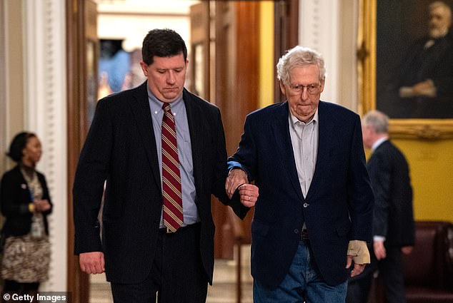 The aide apparently accompanied McConnell to and from the chamber on Wednesday