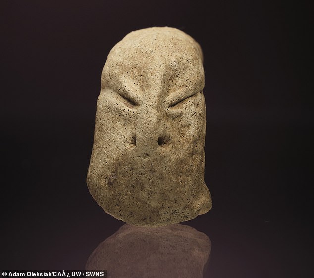 They describe the clay figure as a 'small, finely crafted head, with slanting eyes, a flat nose and an elongated skull'