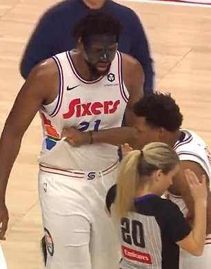 Teammates intervened to try to keep Embiid calm