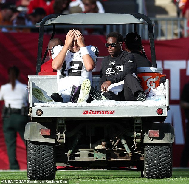 O'Connell is carted off the field in the third quarter against the Tampa Bay Buccaneers