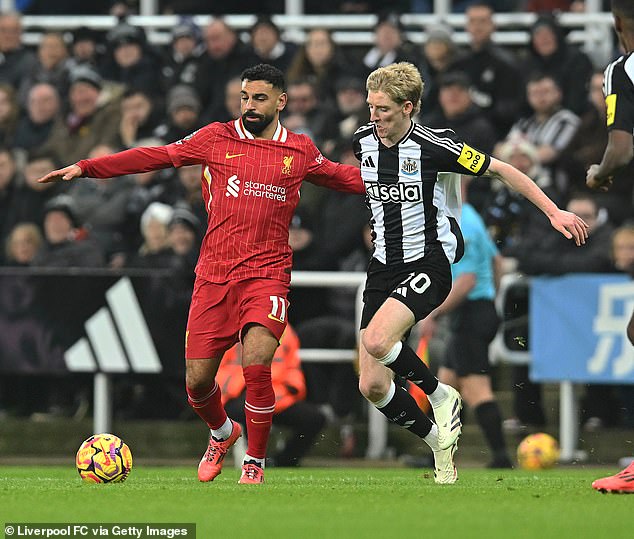 Anthony Gordon (right) in action for Newcastle against Liverpool on Wednesday