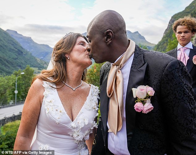 Princess Martha Louise of Norway and her American groom shaman Durek delighted the crowds lining the streets by sharing a kiss after their wedding