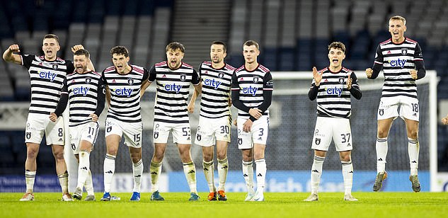 Queen's Park players are happy after a shootout win secured their place in the fourth round