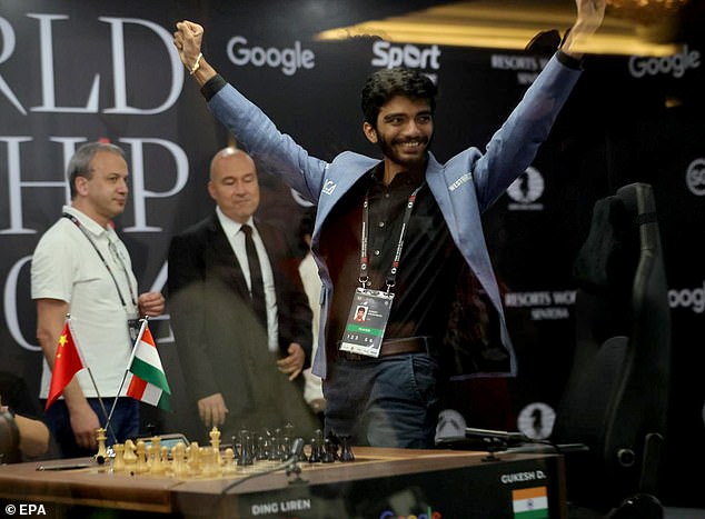 The 18-year-old raised his arms in triumph after becoming the youngest ever champion