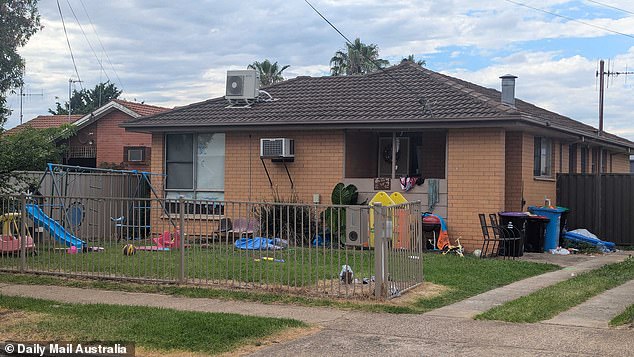 The Gange Street house remained littered with children's play equipment on Monday