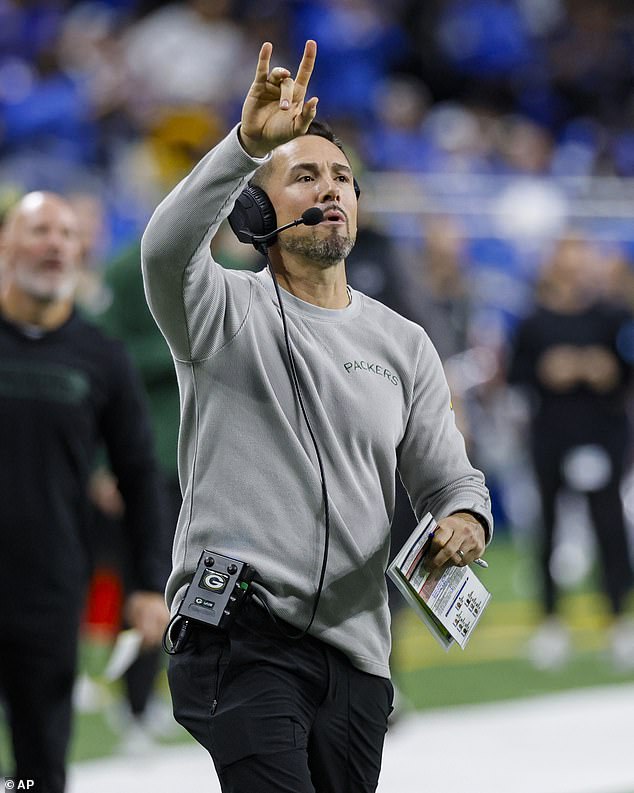 Green Bay Packers head coach Matt LaFleur signals during the first half in Detroit on Thursday