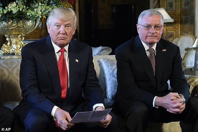 President Donald Trump, center, sits next to retired Lt. Gen. Keith Kellogg, right