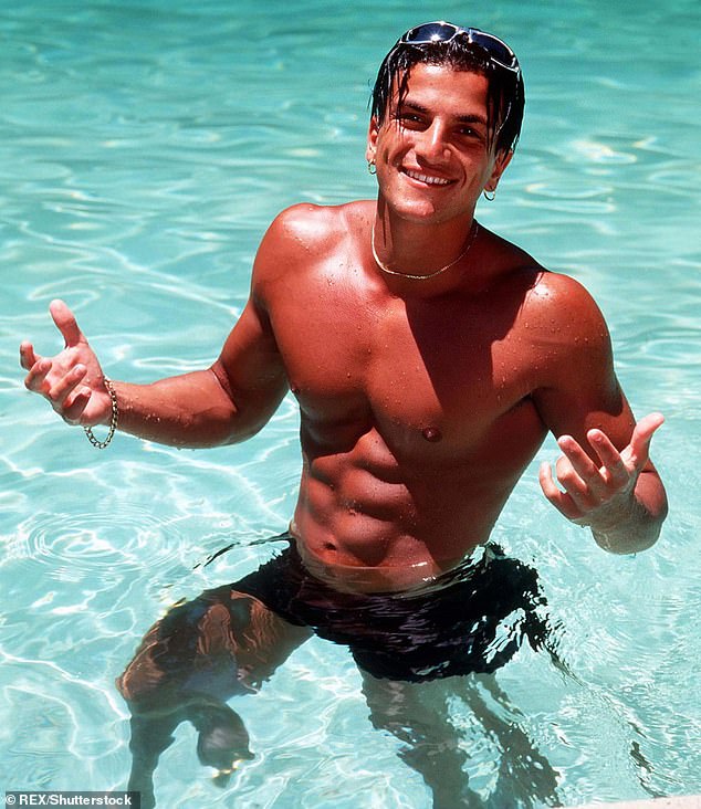 Peter Andre in a swimming pool in 1996, when his song Mysterious Girl attracted attention