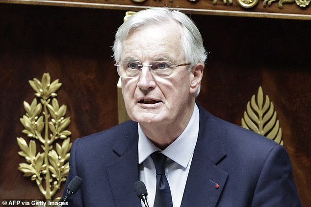 Under fire: French right-wing and left-wing parties said they would support a vote of no confidence against Prime Minister Michel Barnier (pictured) in the coming days