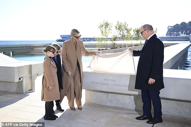 Princess Charlene with her twins Prince Jacques and Princess Gabriella, and Monaco's ruler Prince Albert II. The family opened a new luxury residential complex Mareterra and the complex's saltwater pool was named after Charlene - a former swimming champion