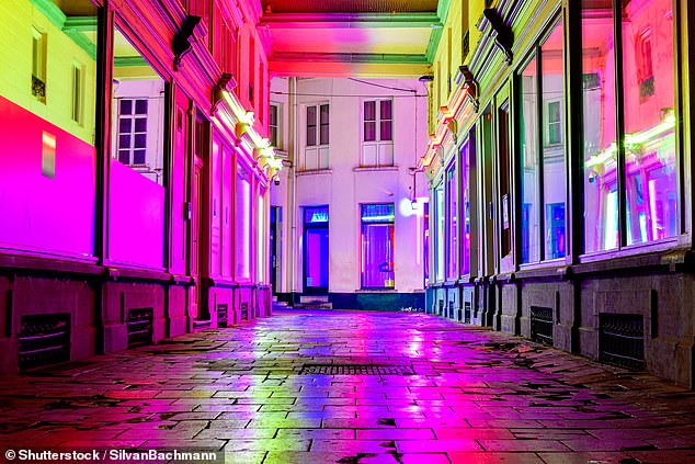 Sex work was decriminalized in Belgium in 2022. Pictured: the Red Light District, 'Glass Alley', in Ghent, Belgium