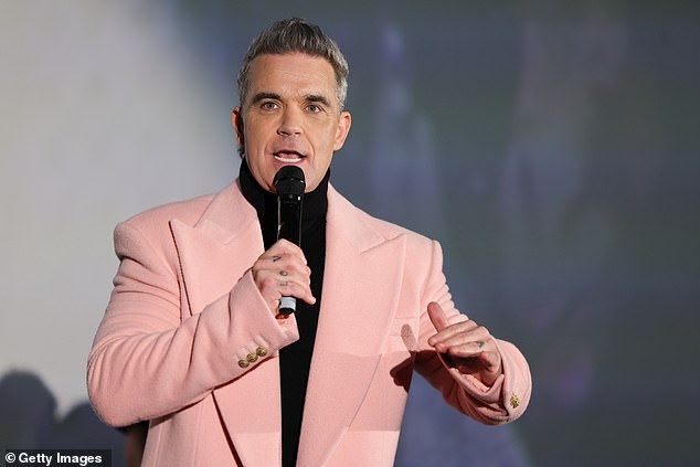 Robbie Williams got candid on Friday when addressing speculation about his sexuality while discussing his highly anticipated biopic Better Man