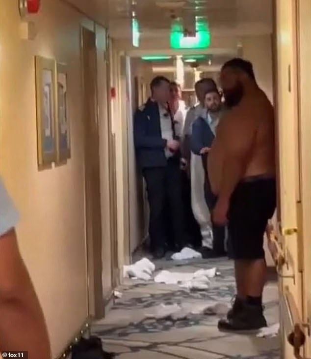 The disturbing footage, captured by Mikhail as he stood just a few meters away, shows the out-of-control male passenger in a fit of rage, kicking a door, shouting profane language and at one point taking off his shirt.