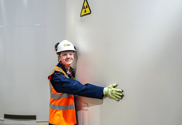 Nuclear for Australia founder Will Shackel, 18, received a barrage of negative comments after he shared a photo of himself hugging a nuclear waste container at Sizewell B - the commercial power station in Suffolk, eastern England (pictured)