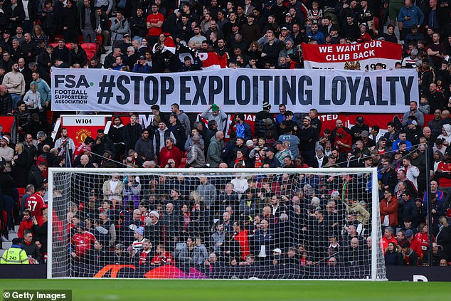 Manchester United and Liverpool fans come together to protest against rising ticket prices. Pictured: Red Devils supporters display a banner during their match against Everton this month