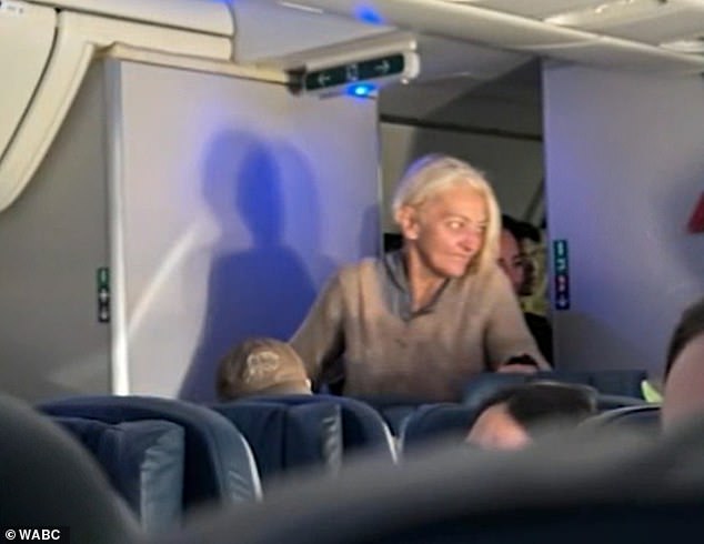 Passengers filmed her during the flight as she migrated back and forth between the plane's bathrooms because she didn't have a seat