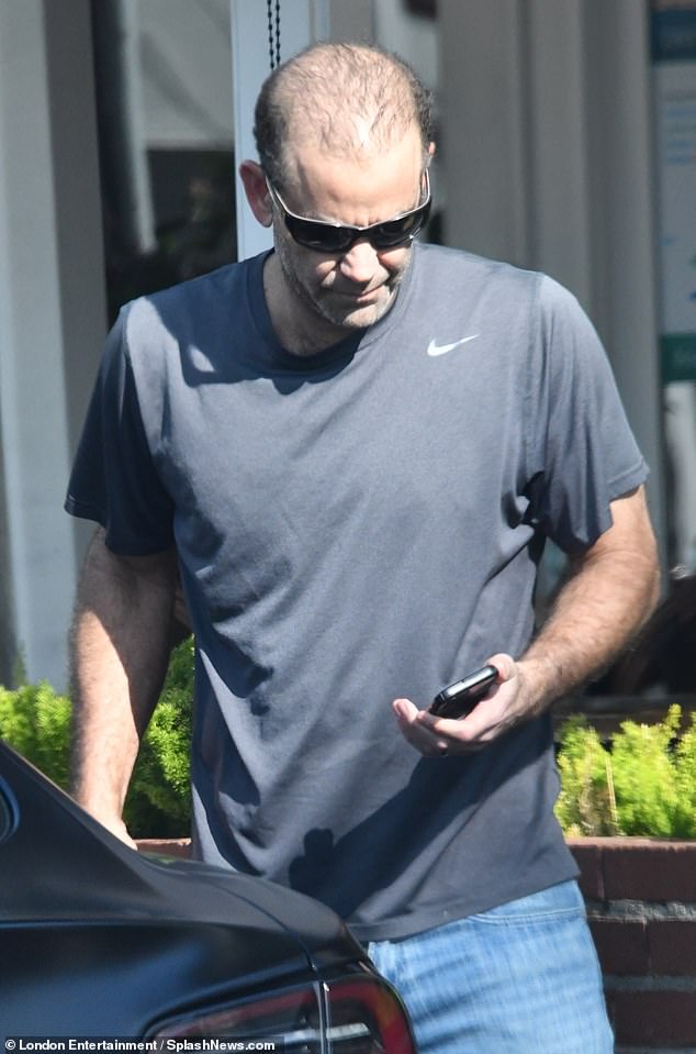 In another photo, tennis legend Sampras could be seen looking at his cell phone