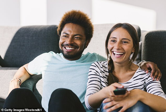 Signs your relationship isn't working, according to the research, include: you spend more time on social media than talking to your partner and you don't try 'as hard' to look nice (stock image)