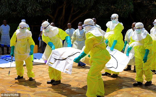 2018: Congolese officials and World Health Organization officials wear protective suits as they participate in training against the Ebola virus near the city of Beni in the North Kivu province of the Democratic Republic of Congo