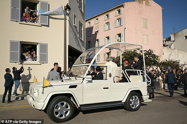 Pope Francis arrives to pay his respects to the small statue of the Madonuccia (the patron saint of Ajaccio) in Ajaccio, as part of his trip to the French island of Corsica, on December 15, 2024